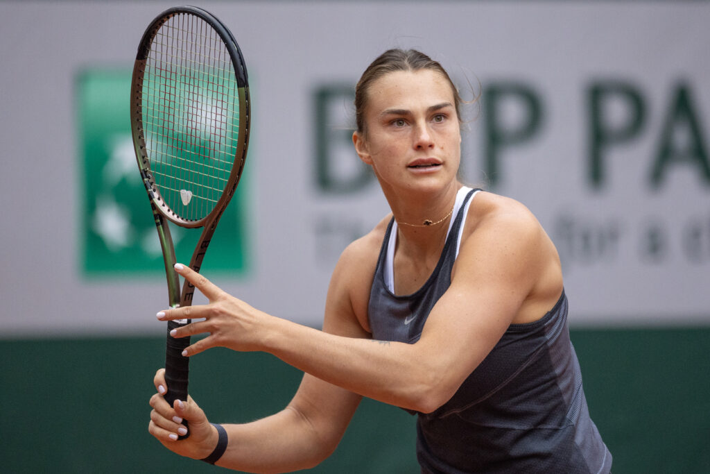 Aryna Sabalenka celebrates her advance to the Roland Garros 2023 quarterfinals, showcasing her skill and determination.