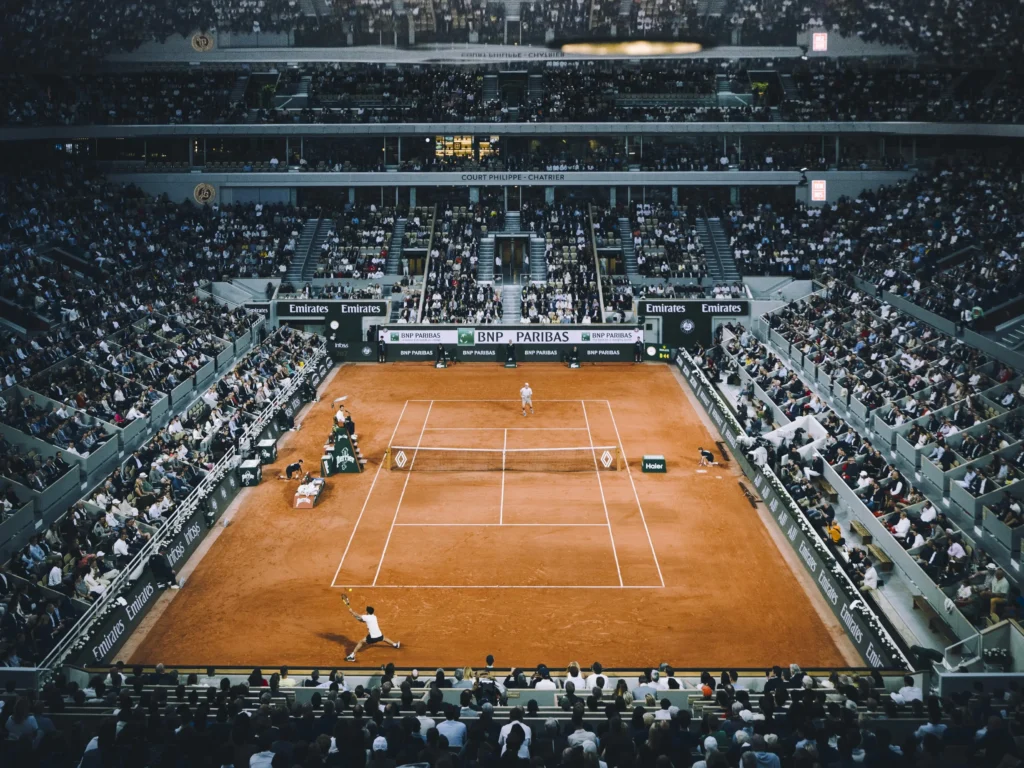 Novak Djokovic celebrates a crucial point during his quarter-final match at the French Open 2025 against Alexander Zverev.